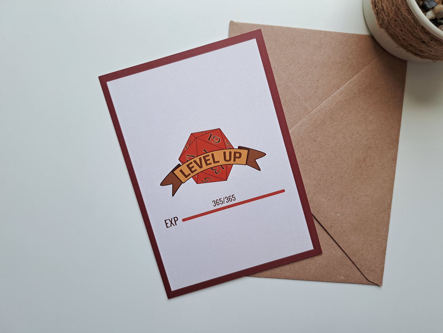 Birthday greeting card with D20 where exp bar is fully filled