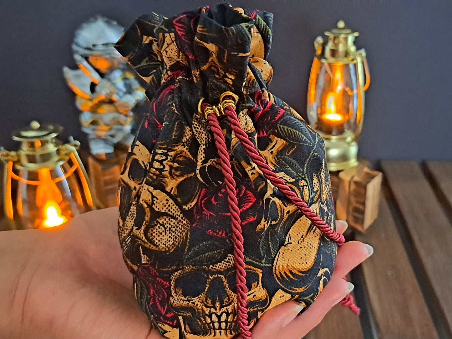 Zoomed in image of Handmade dice bag with skulls and roses pattern