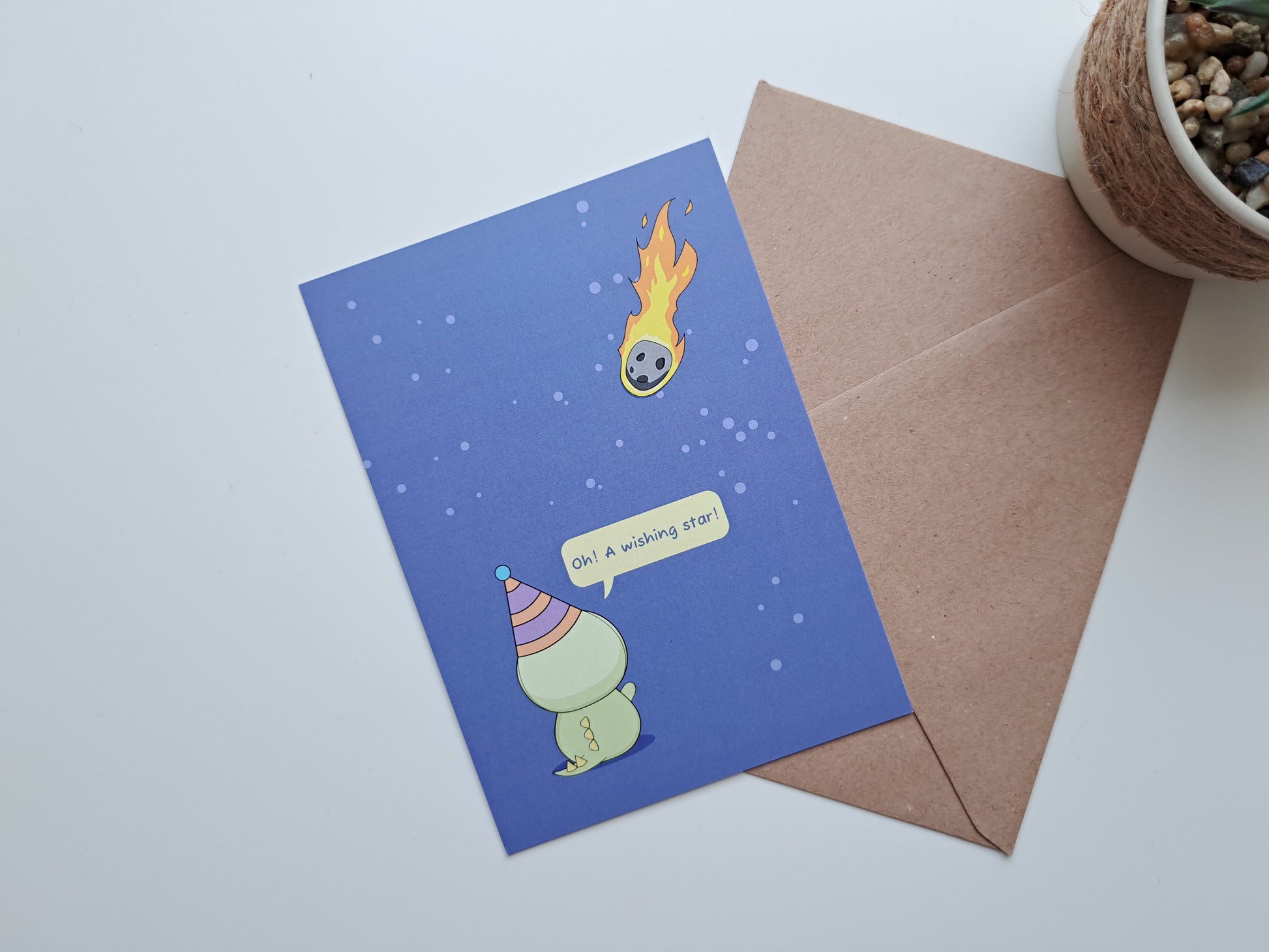 Birthday greeting card with Dinosaur wishing upon a meteorite