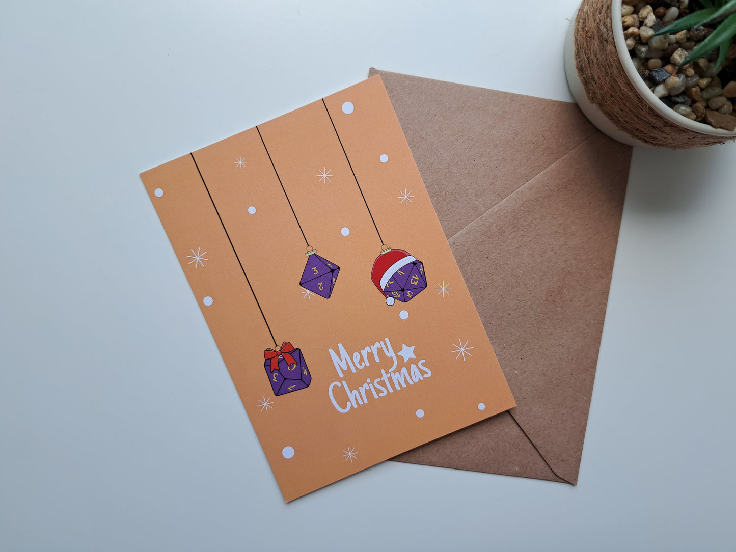 Christmas greeting card with Dice decoration on orange background