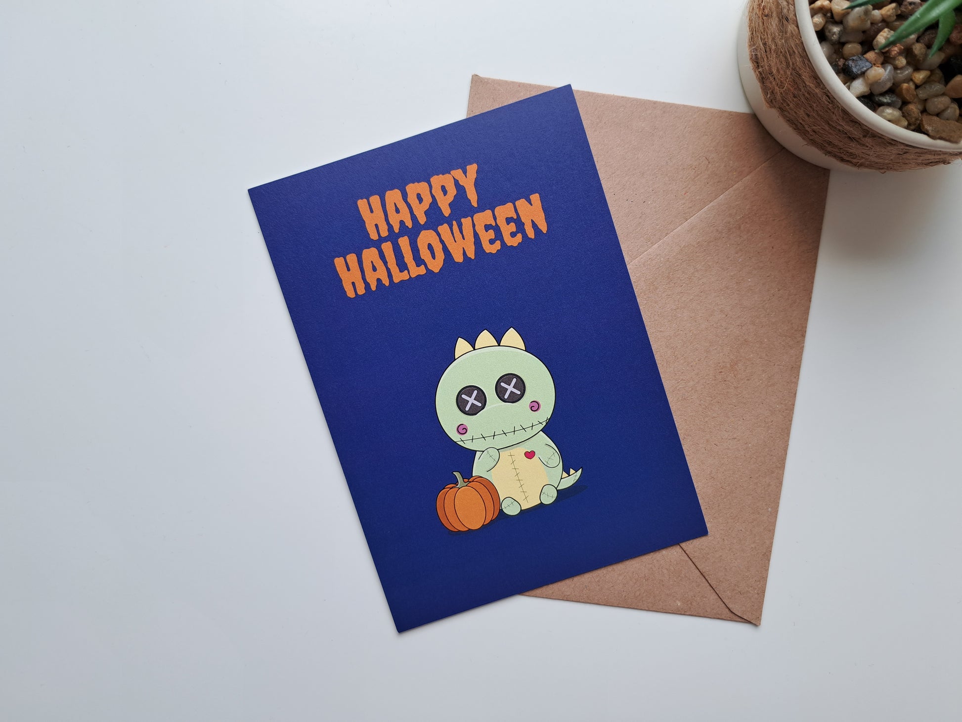 Halloween greeting card with Dinosaur dressed as voodoo doll