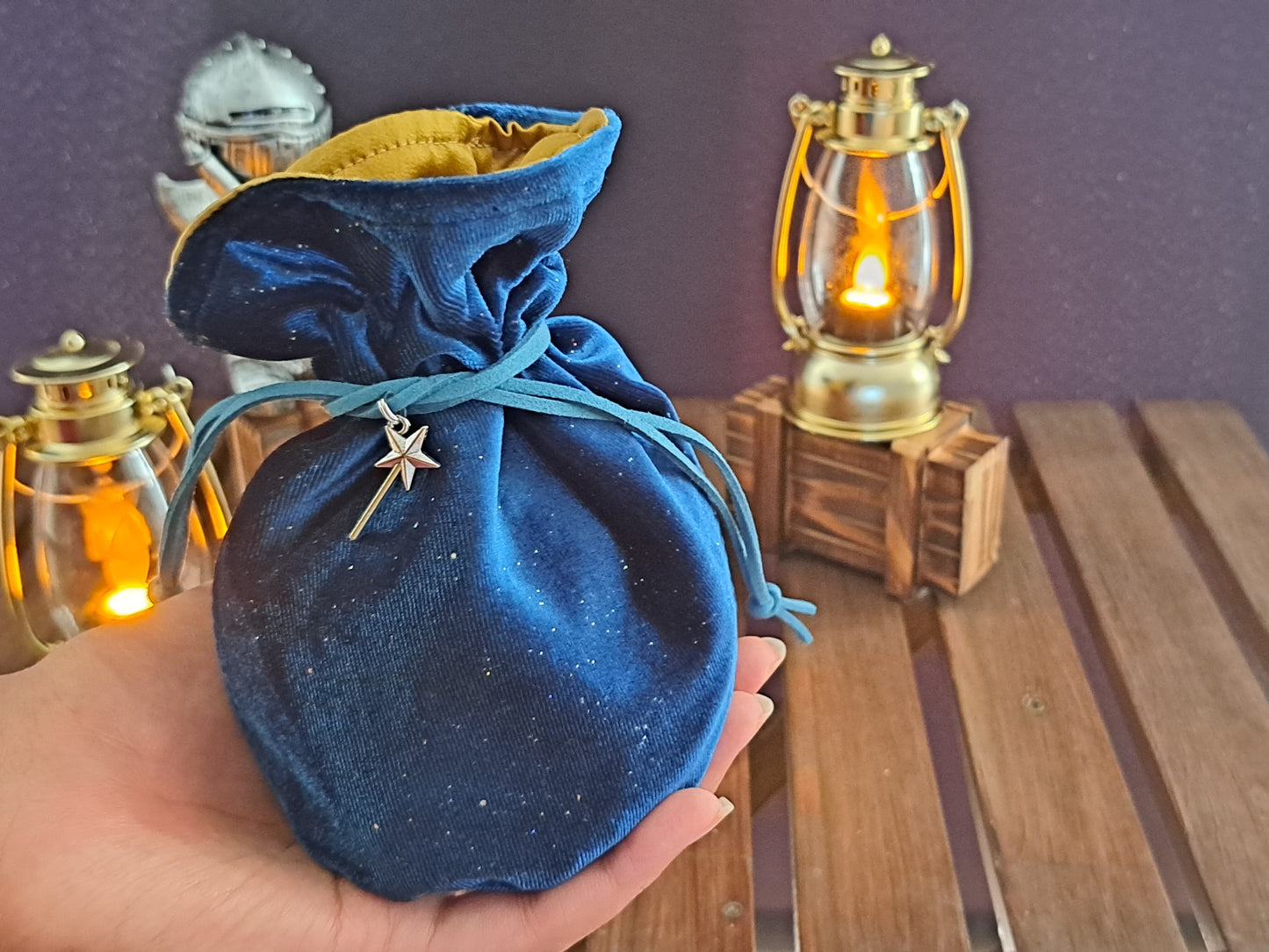 Zoomed in image of Handmade dice bag made out of sparkly blue fabric