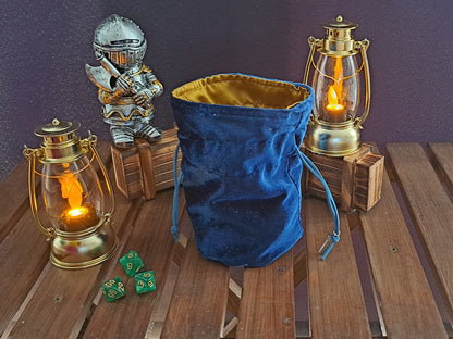 Handmade dice bag made out of sparkly blue fabric