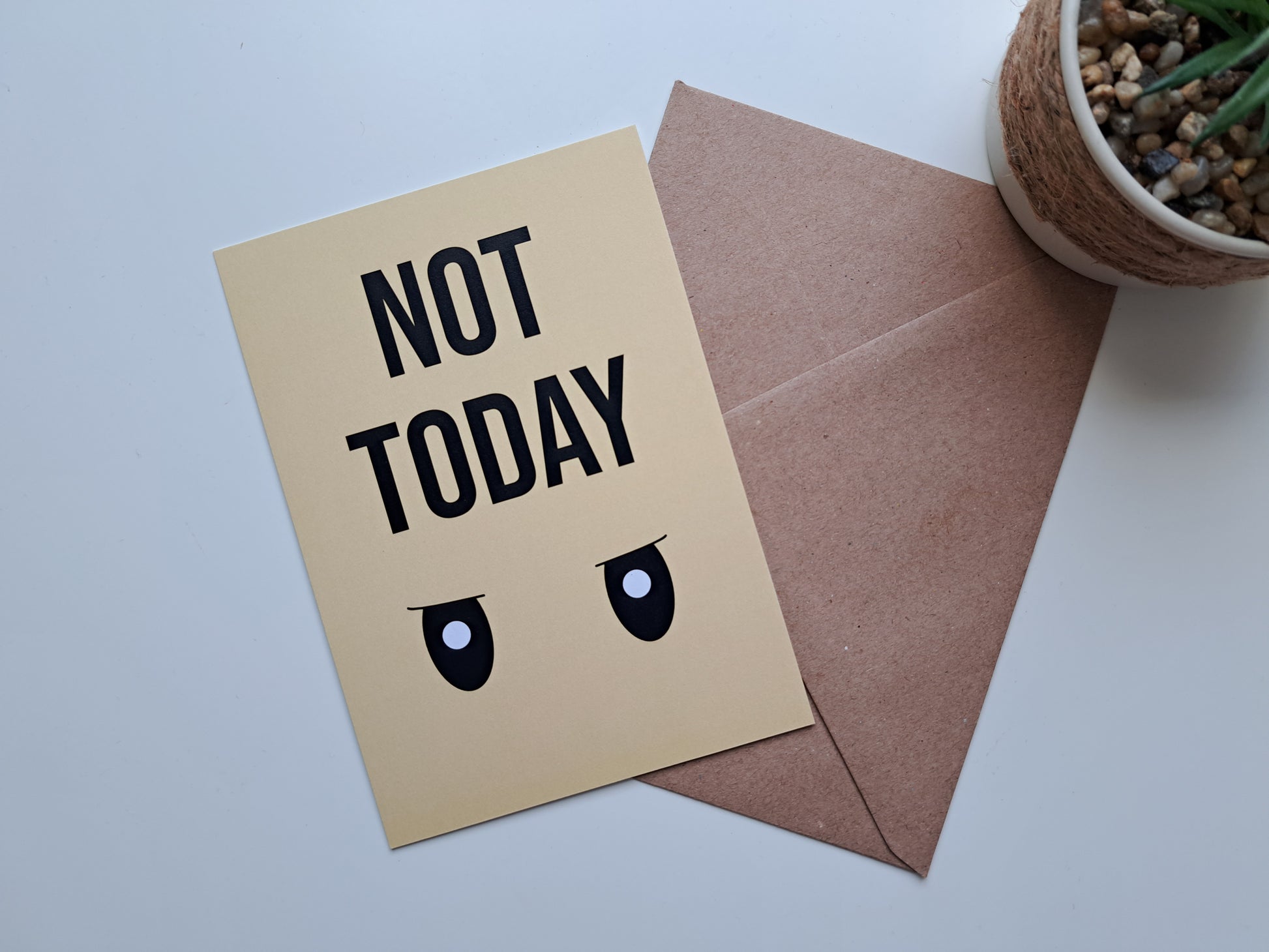 Mood greeting card with Angry Dinosaur eyes with the saying not today