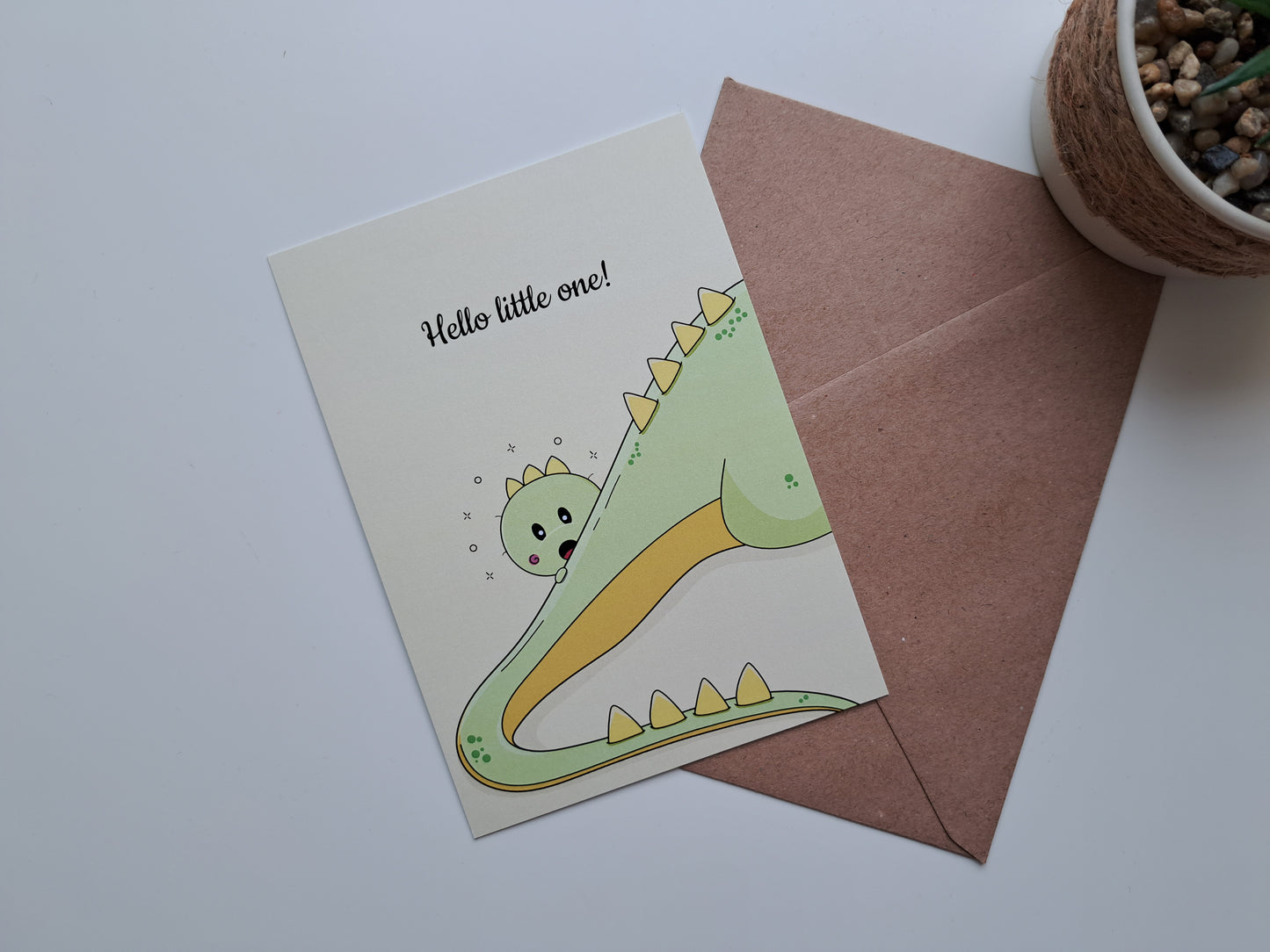 New baby greeting card with a Shy dinosaur hiding behind this mom
