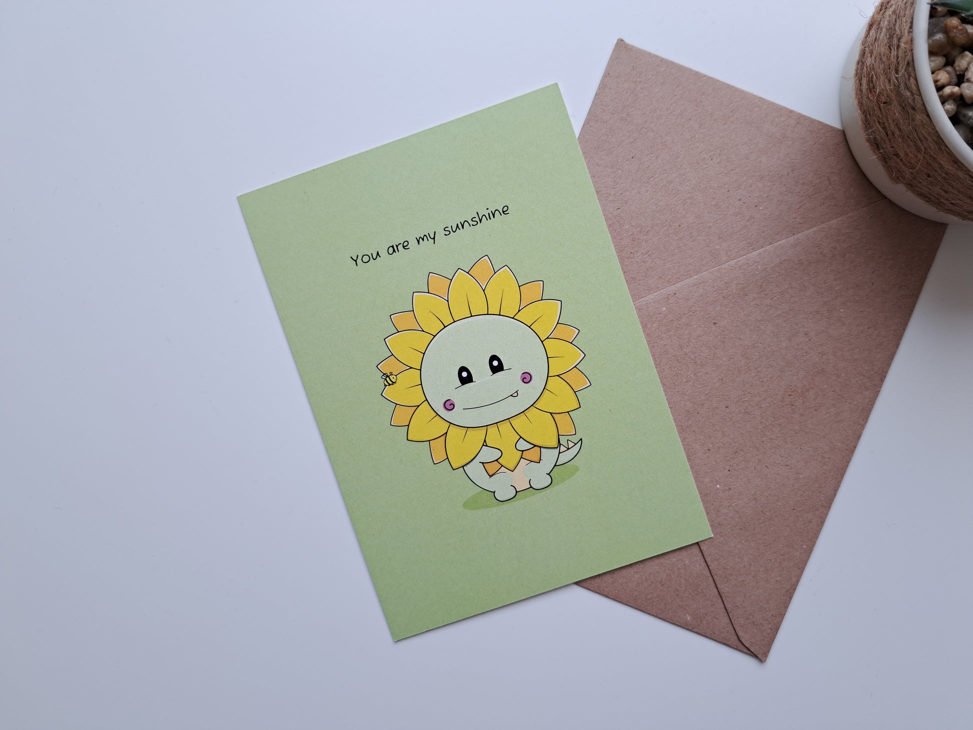 Thinking of you greeting card with Dinosaur dressed as a sunflower and the text: you are my sunshine